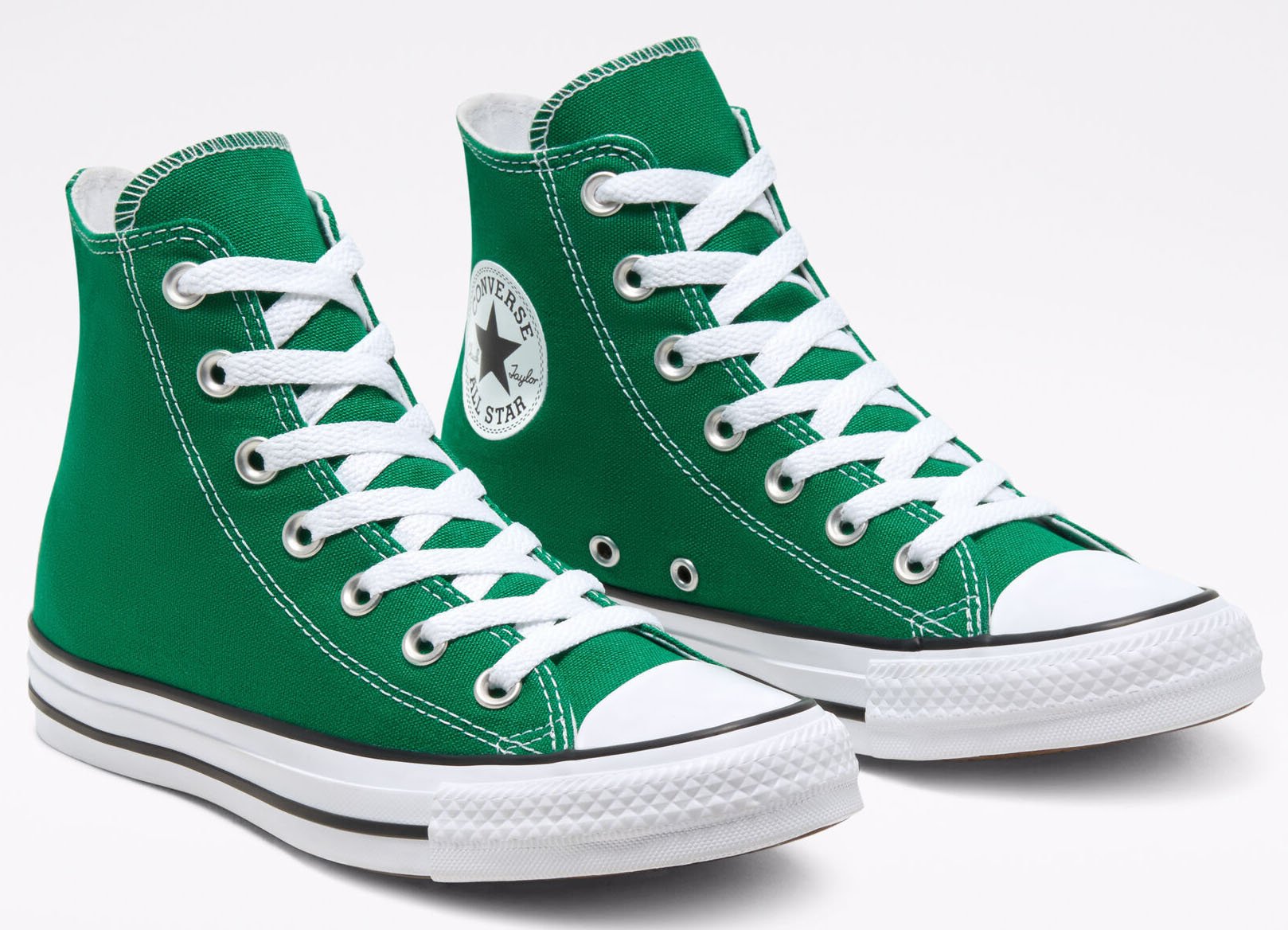 The Converse Colors Chuck Taylors come in fresh Amazon Green colorway and have the iconic Chuck Taylor ankle patch and classic woven tongue label