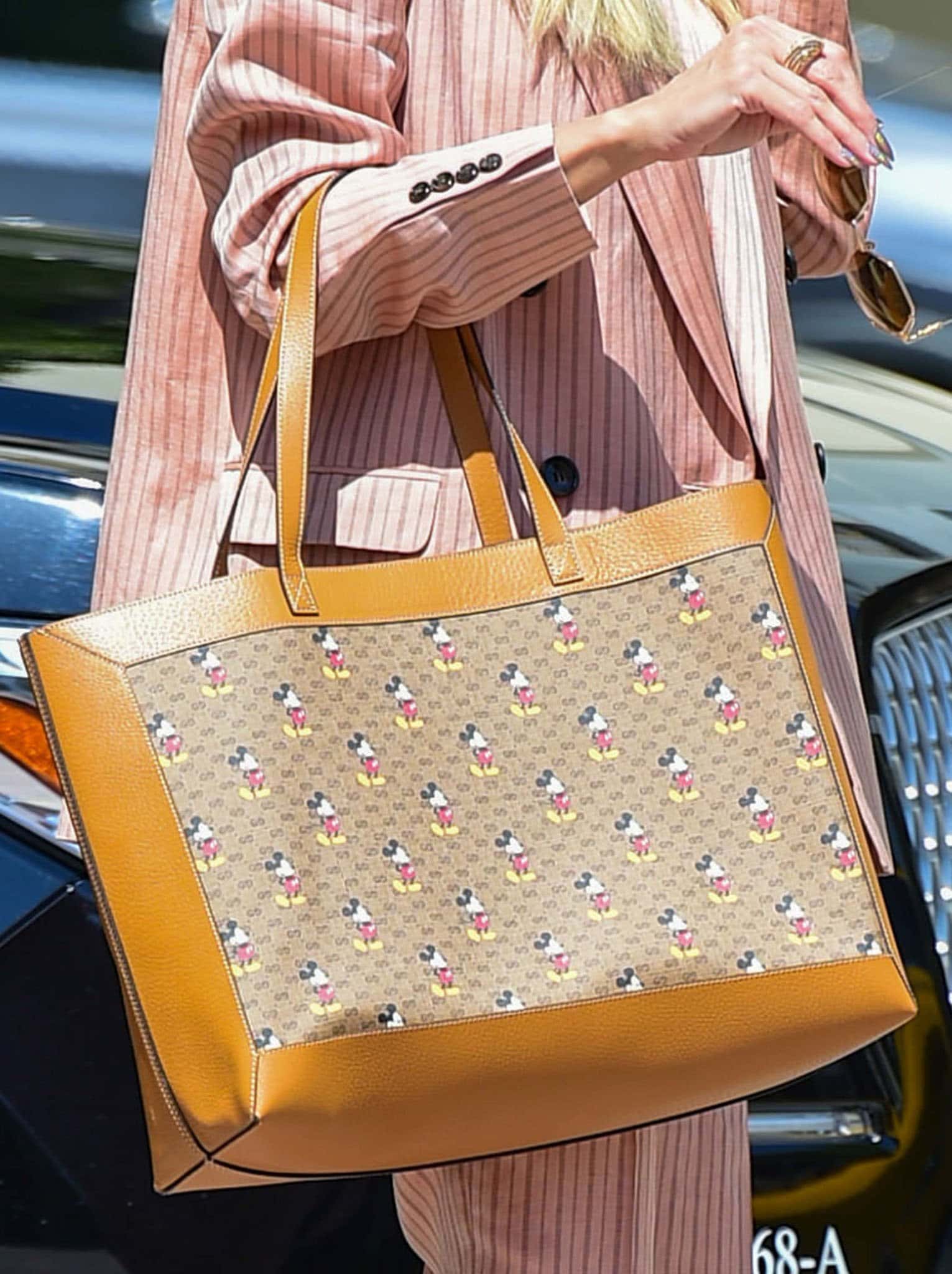 Heidi Klum carries a Gucci x Disney Mickey tote bag