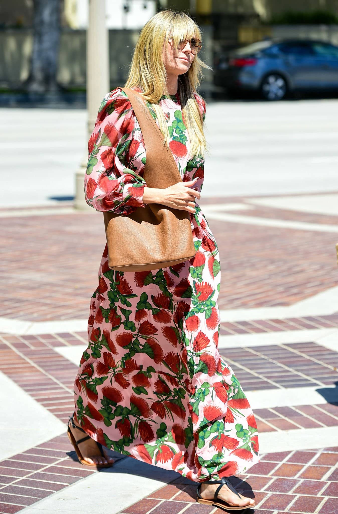 Heidi Klum dons the perfect spring dress from Adriana Degreas on April 18, 2021