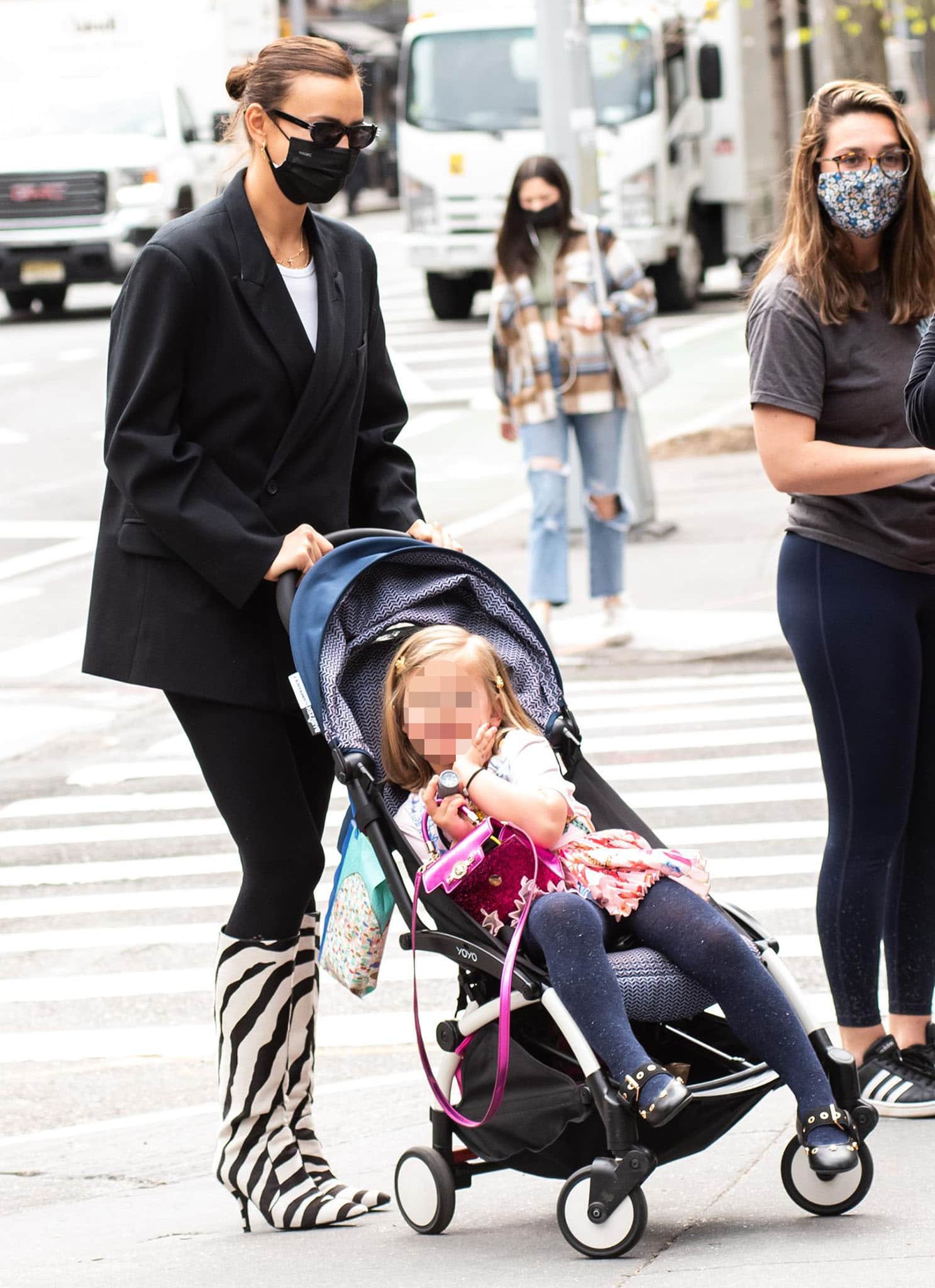 Irina Shayk opts for business casual attire as she pushes her daughter's stroller around SoHo