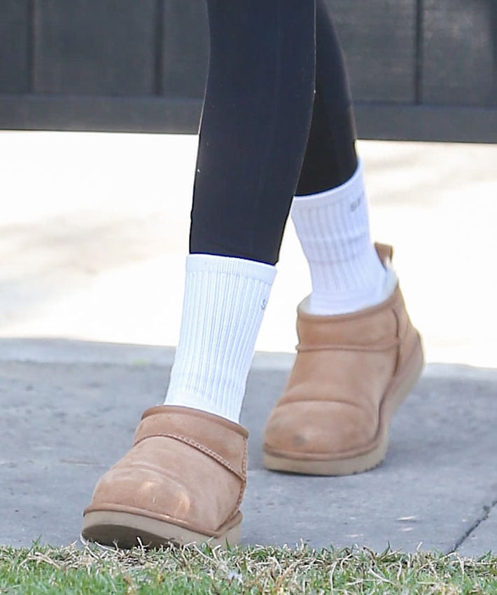 Kaia Gerber finishes her Pilates class look with cozy UGG Classic Ultra Mini boots