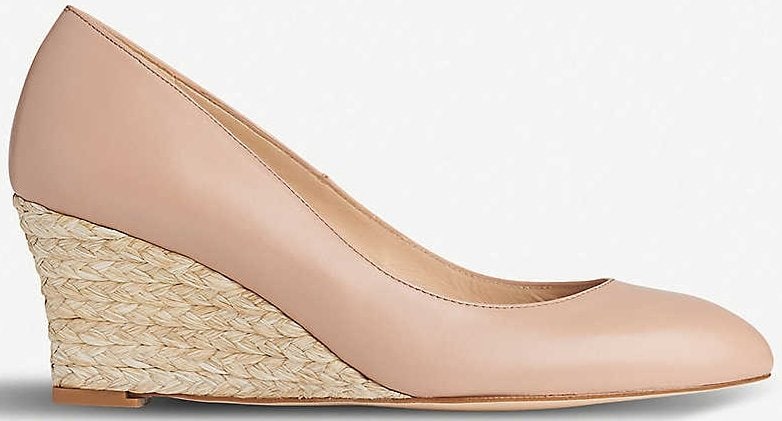 Supple leather sits atop a woven jute sole, standing on a streamlined heel with just enough height