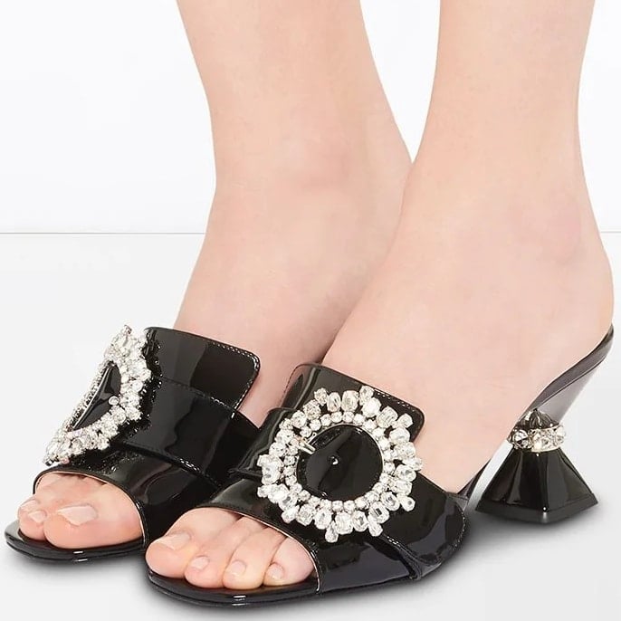 Slip into these embellished buckle Miu Miu mules and add some spark to your day