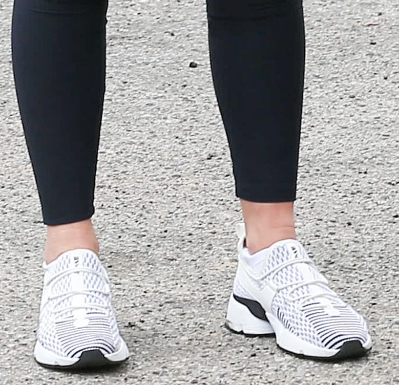 Olivia Munn completes a black-and-white athleisure with Avre Infinity Glide shoes