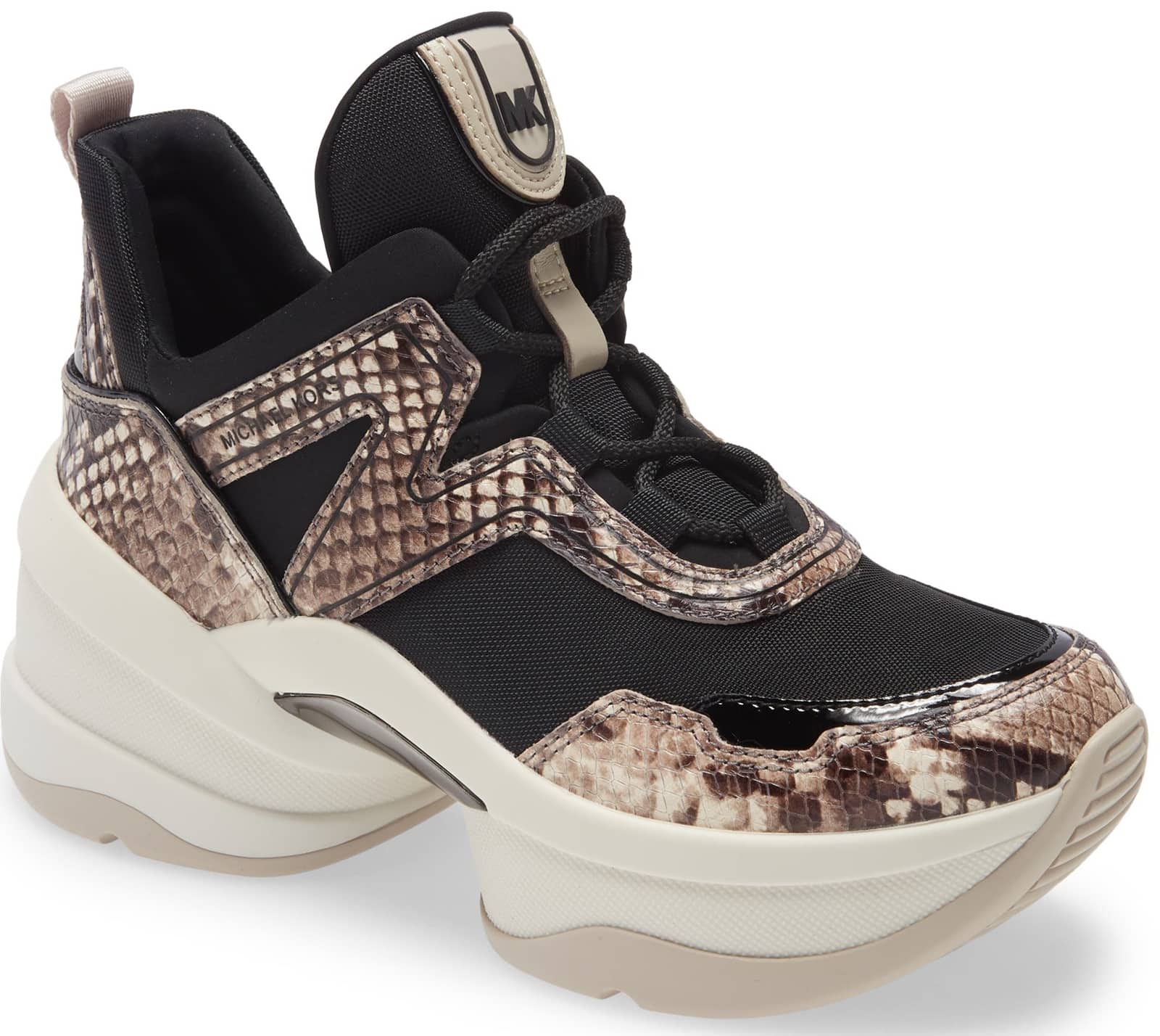 A futuristic sole brings striking height and retro-inspired flair to a sporty sneaker featuring a mixed-media design