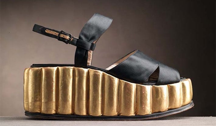 This satin sandal with sculpted kidskin-covered cork platform is just one of the first few wedge shoes designed by Salvatore Ferragamo in the 1940's