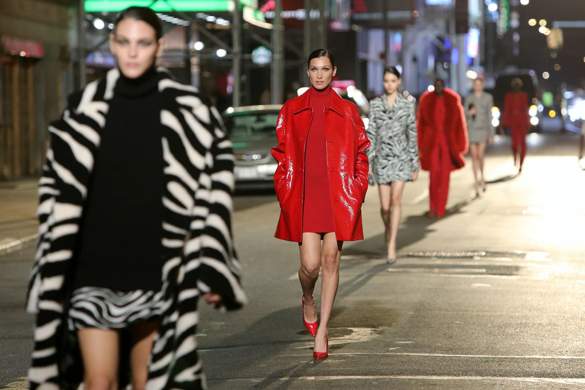 Supermodels hit the New York City street in Michael Kors' latest outfit designs