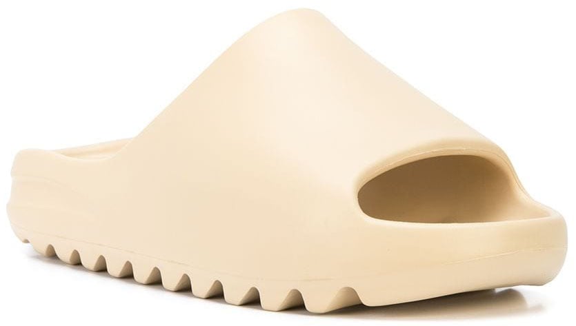 The Yeezy slide features EVA Foam for lightweight durability