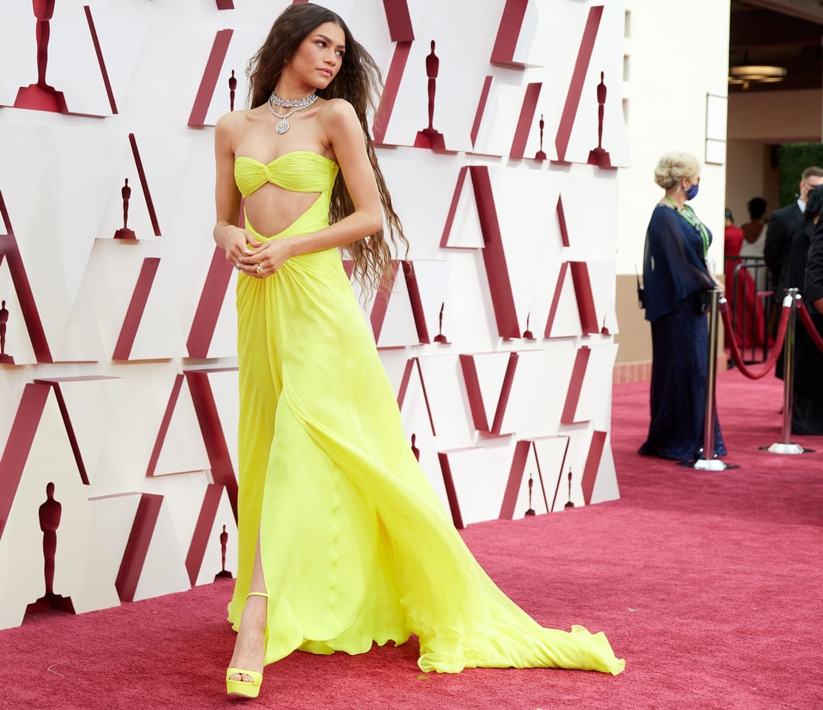 Zendaya wore a bright yellow strapless gown that glows in the dark