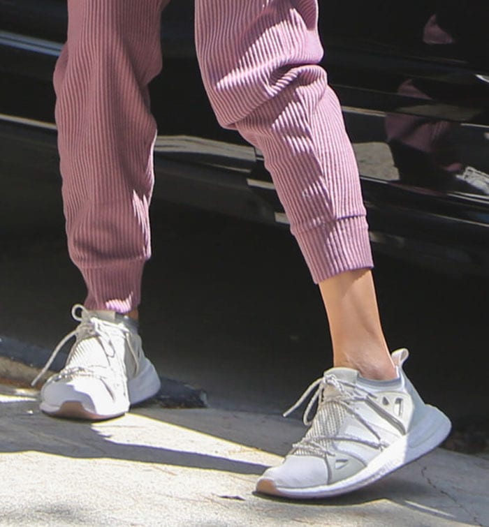 Alessandra Ambrosio completes her sporty look with Adidas Arkyn sneakers