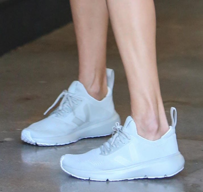 Alessandra Ambrosio completes her sporty outfit with Rick Owens x Veja Runner trainers