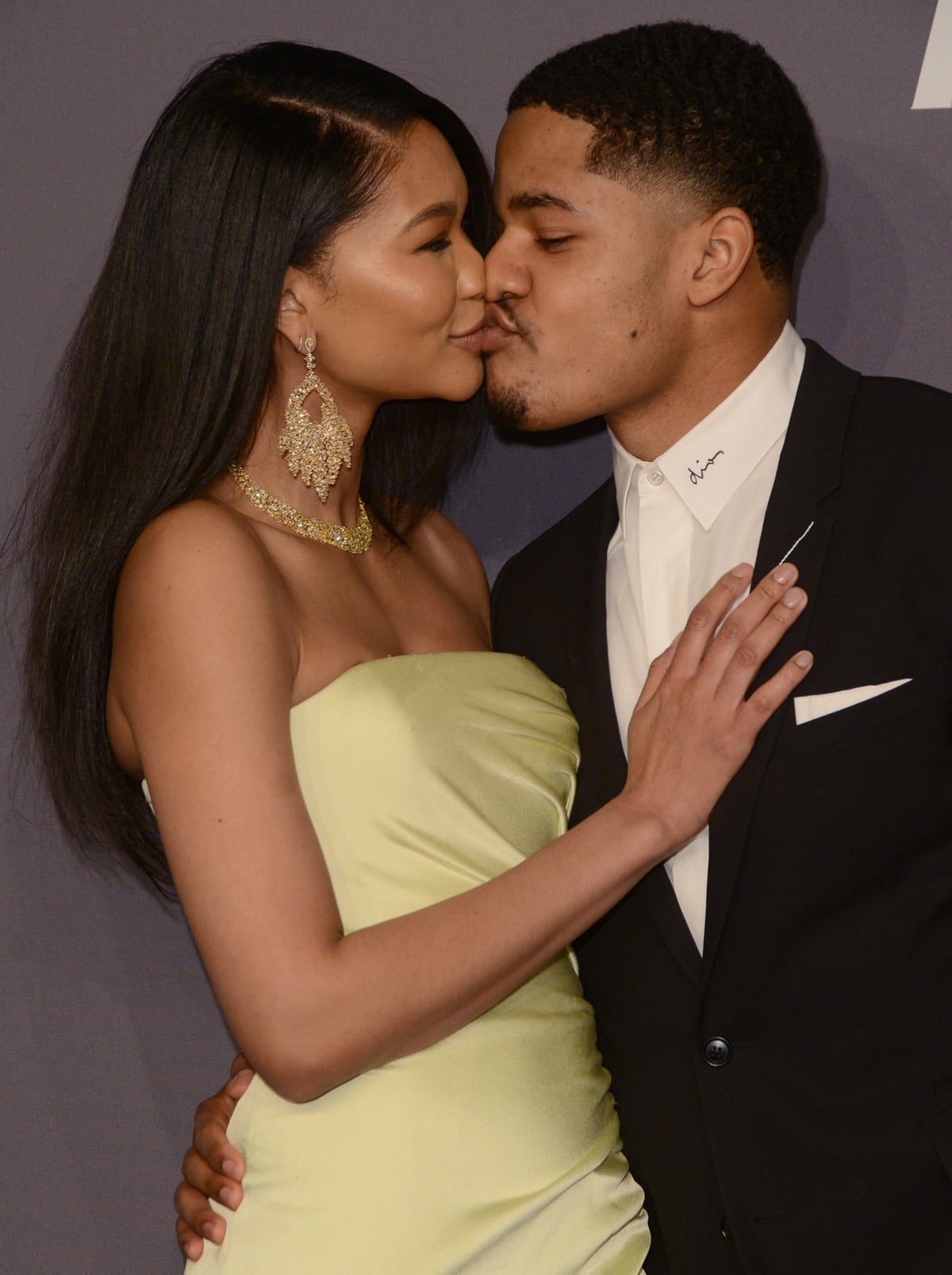 Chanel Iman kissing her husband Sterling Shepard at the amfAR New York Gala 2019