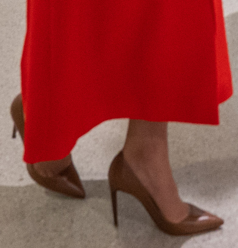 Kate Middleton teams her red coat with brown Ralph Lauren pumps