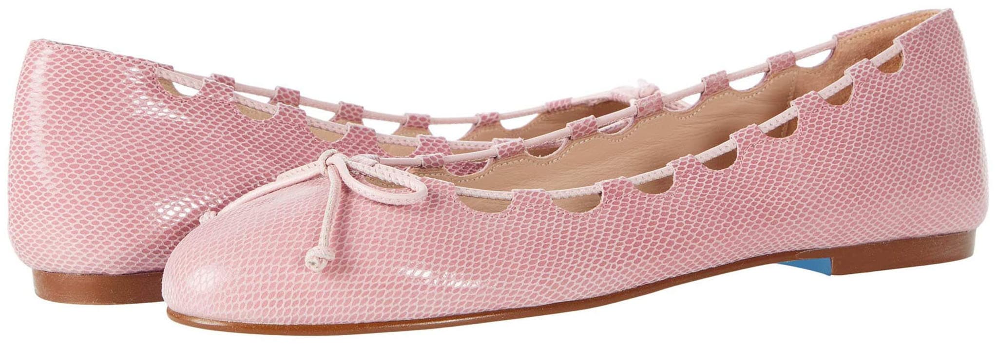 A modern ballet flat made from embossed leather with laced geometric cutouts and bow vamps