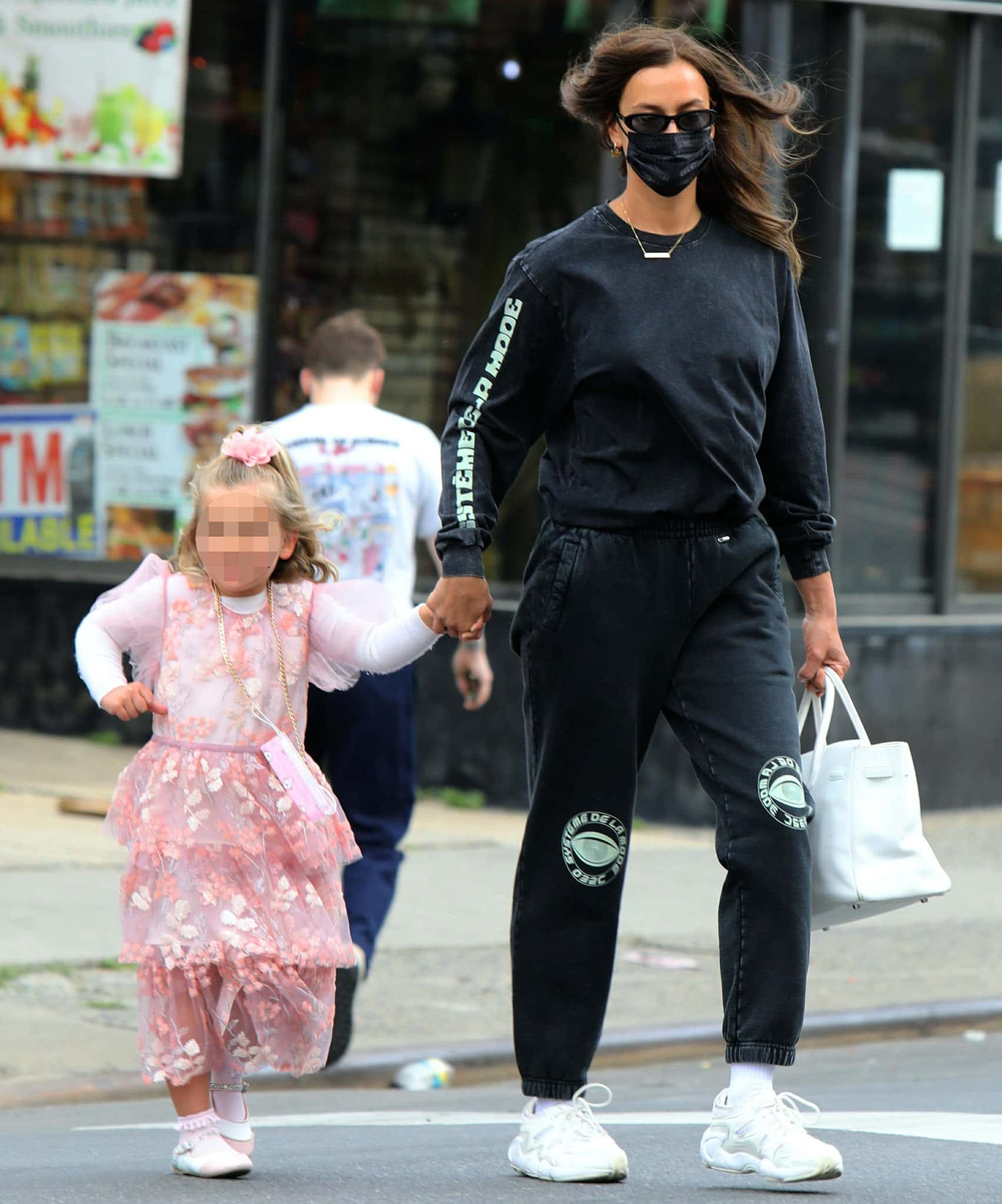 Irina Shayk shows off street style in 032C sweatsuit while Lea dresses up in Self-Portrait pink dress