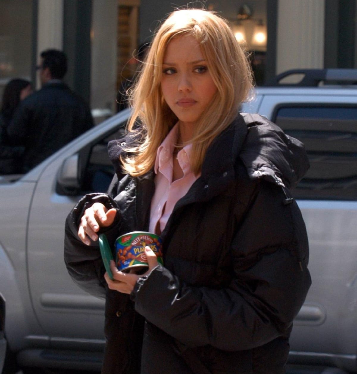 Jessica Alba takes a break on the set of Fantastic Four while enjoying a snack between scenes