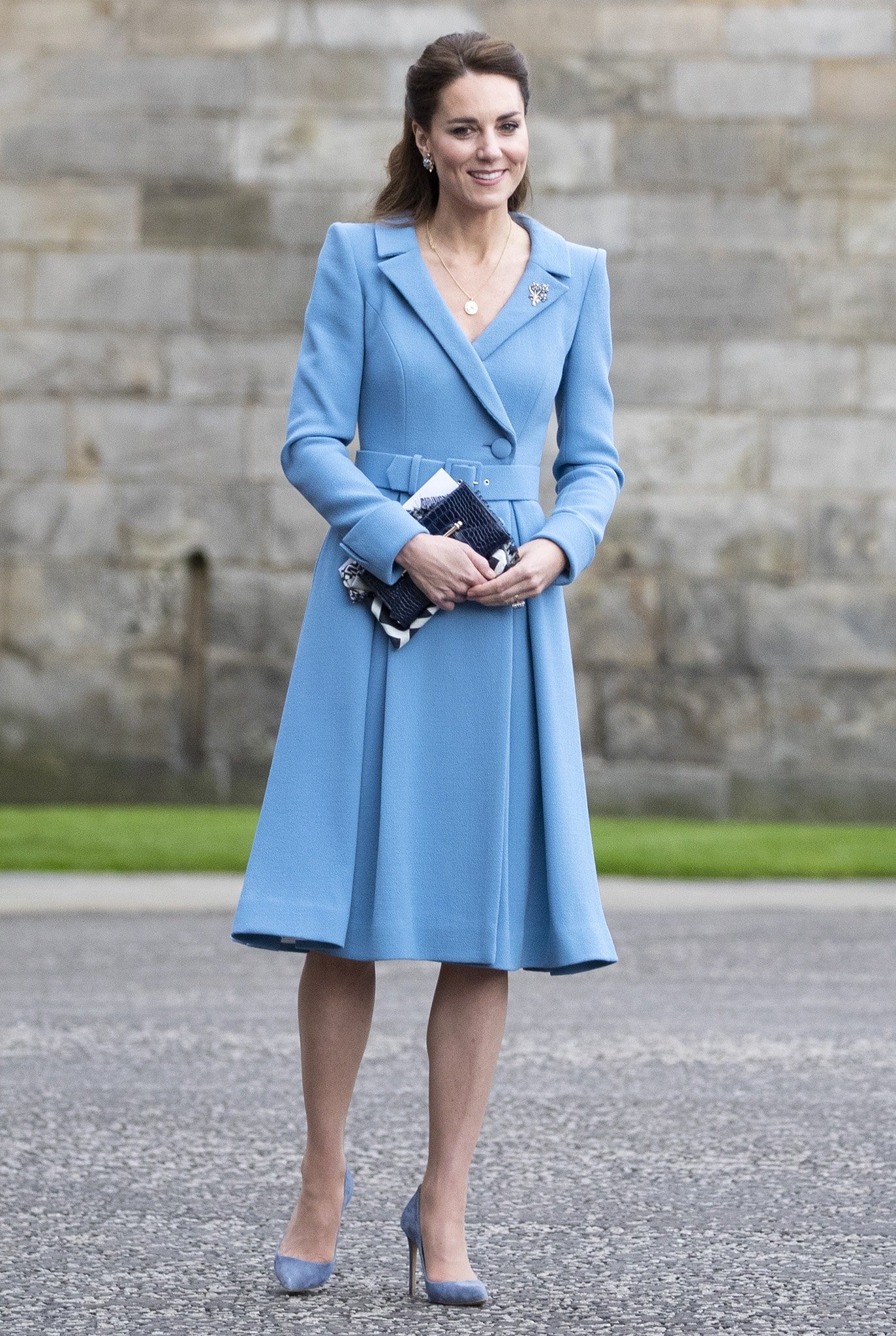 Catherine, Duchess of Cambridge, looks elegant in her Catherine Walker blue coat dress