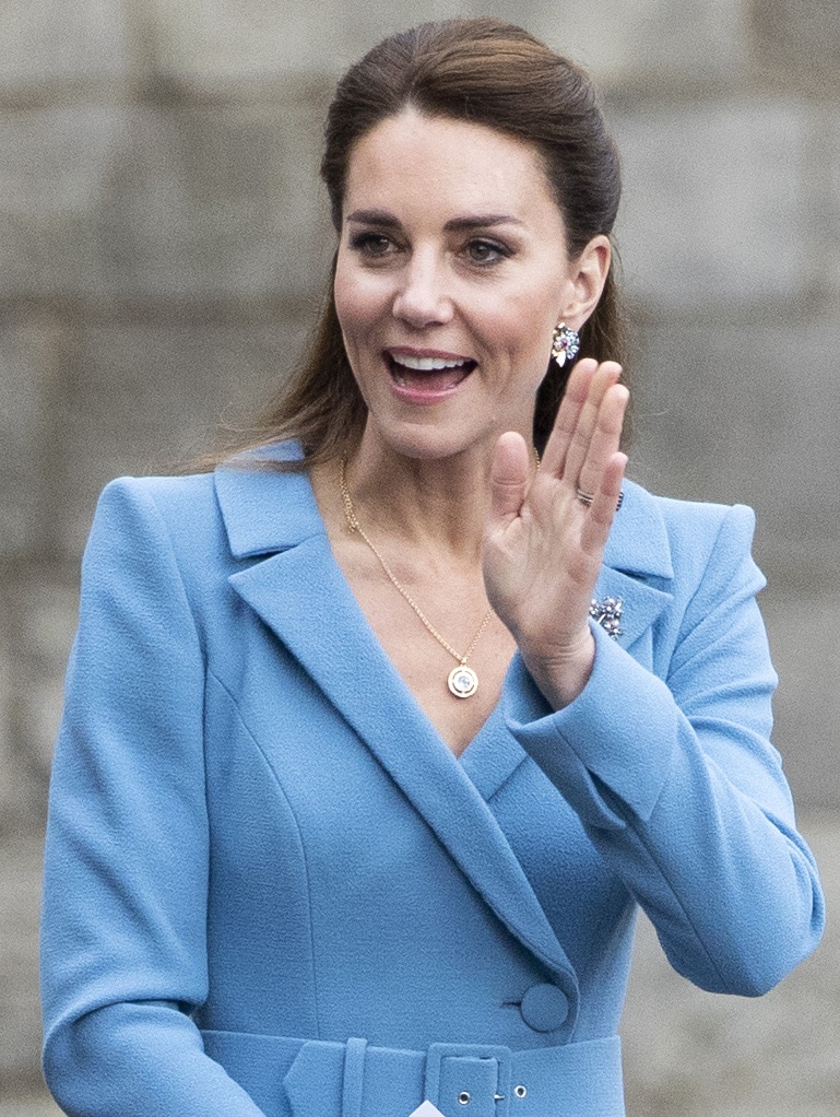 Kate Middleton wears simple makeup and sweeps her hair into a half-up, half-down style