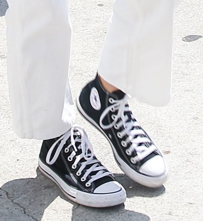 Kendall Jenner stays comfy with a pair of Converse Chuck Taylor Hi sneakers