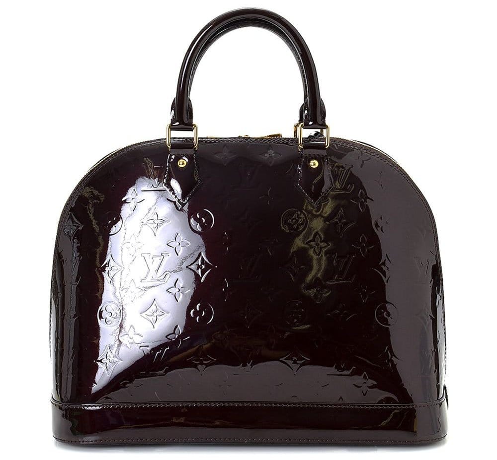 A classic favorite, the Louis Vuitton Alma features an elegant structured design in shiny Monogram Vernis