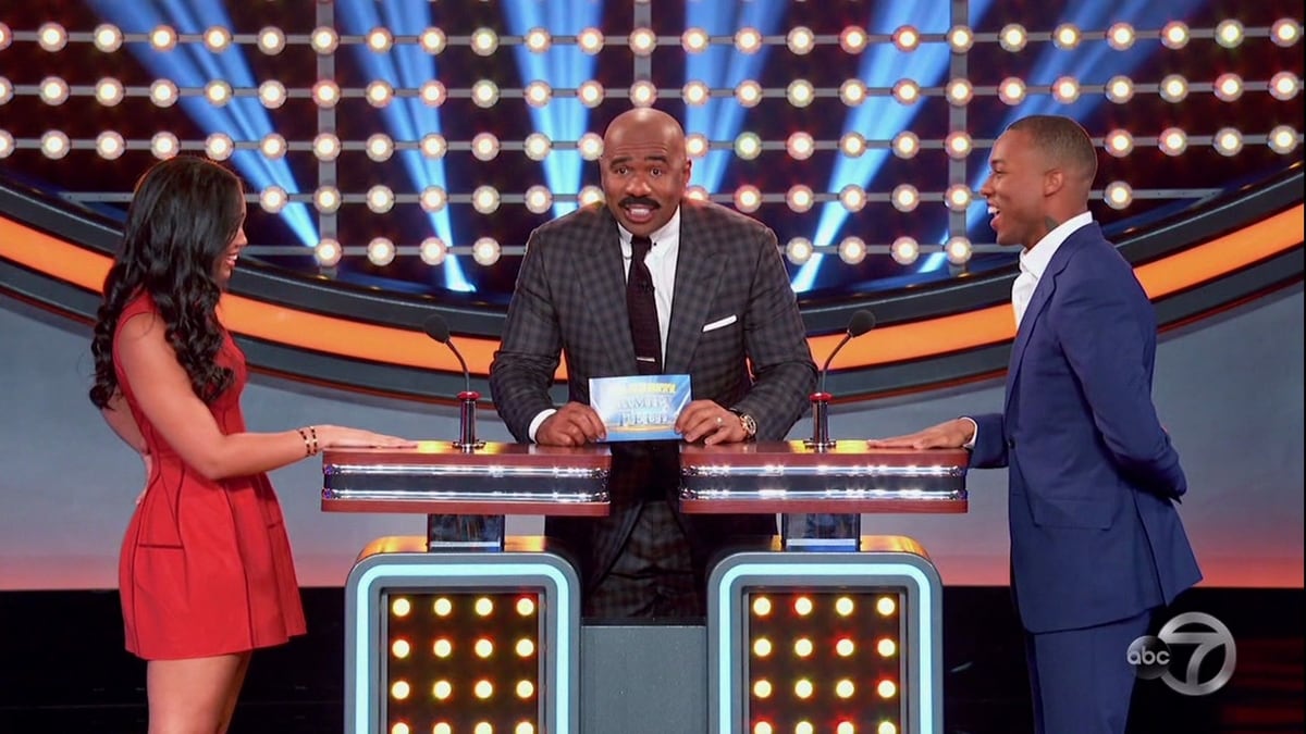 Steve Harvey, Lori Harvey, and Broderick Harvey Jr. during an appearance on ABC's Celebrity Family Feud