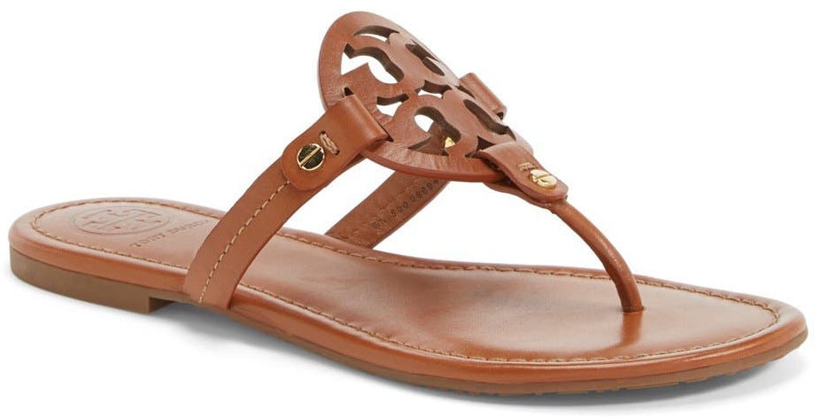 Sophisticated yet comfy, Tory Burch's Miller sandal features a foam-cushioned footbed and a bold logo cutout design