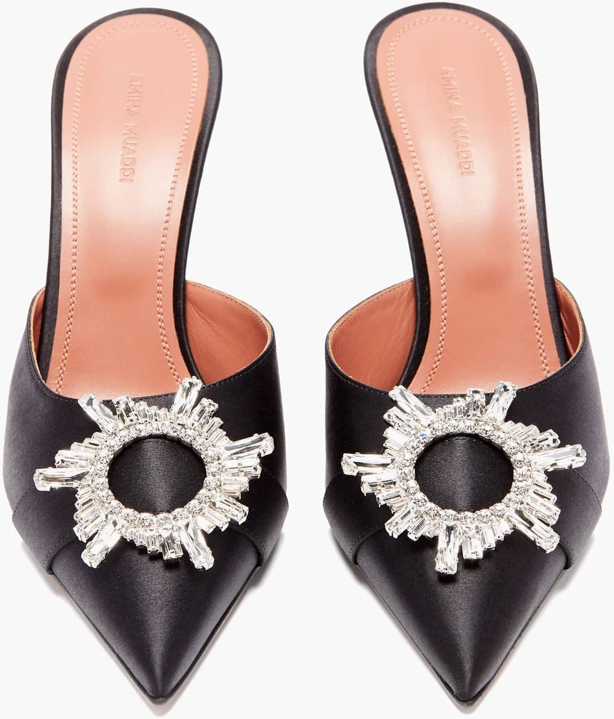 Amina Muaddi’s black Begum mules are embellished with crystal buckles for an opulent mood