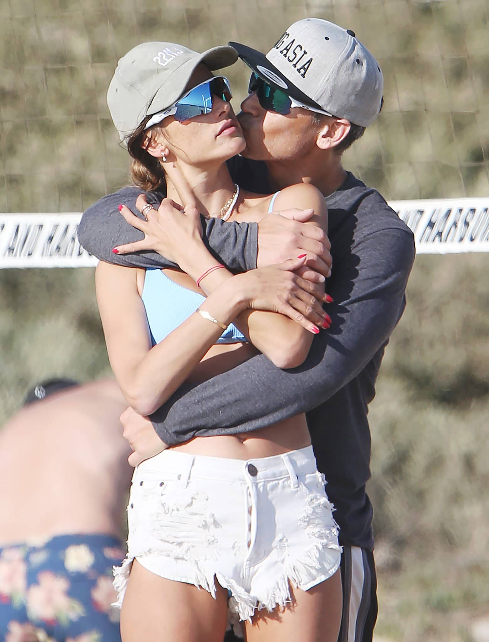 Richard Lee enjoys cuddling girlfriend Alessandra Ambrosio in gray long-sleeved top and cap