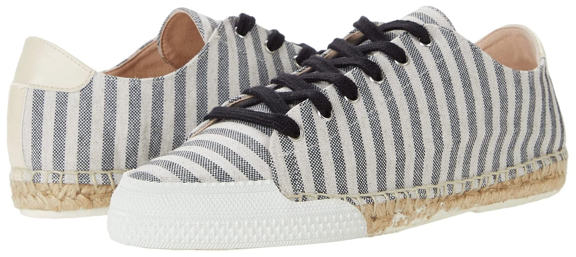 A handcrafted and hand-dyed espadrille sneaker with a lace-up closure and a jute-wrapped sole