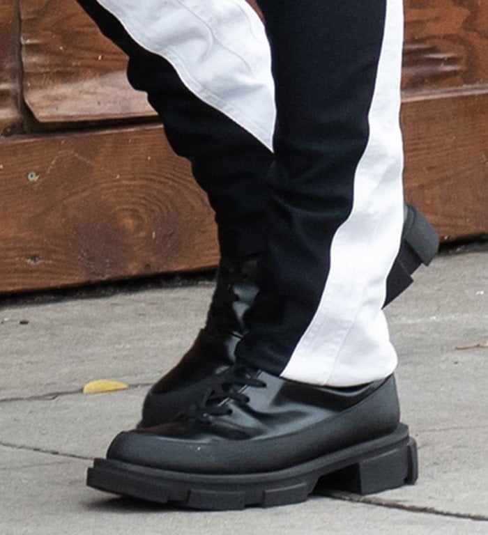 Irina Shayk completes her edgy black-and-white look with Both Gao combat boots