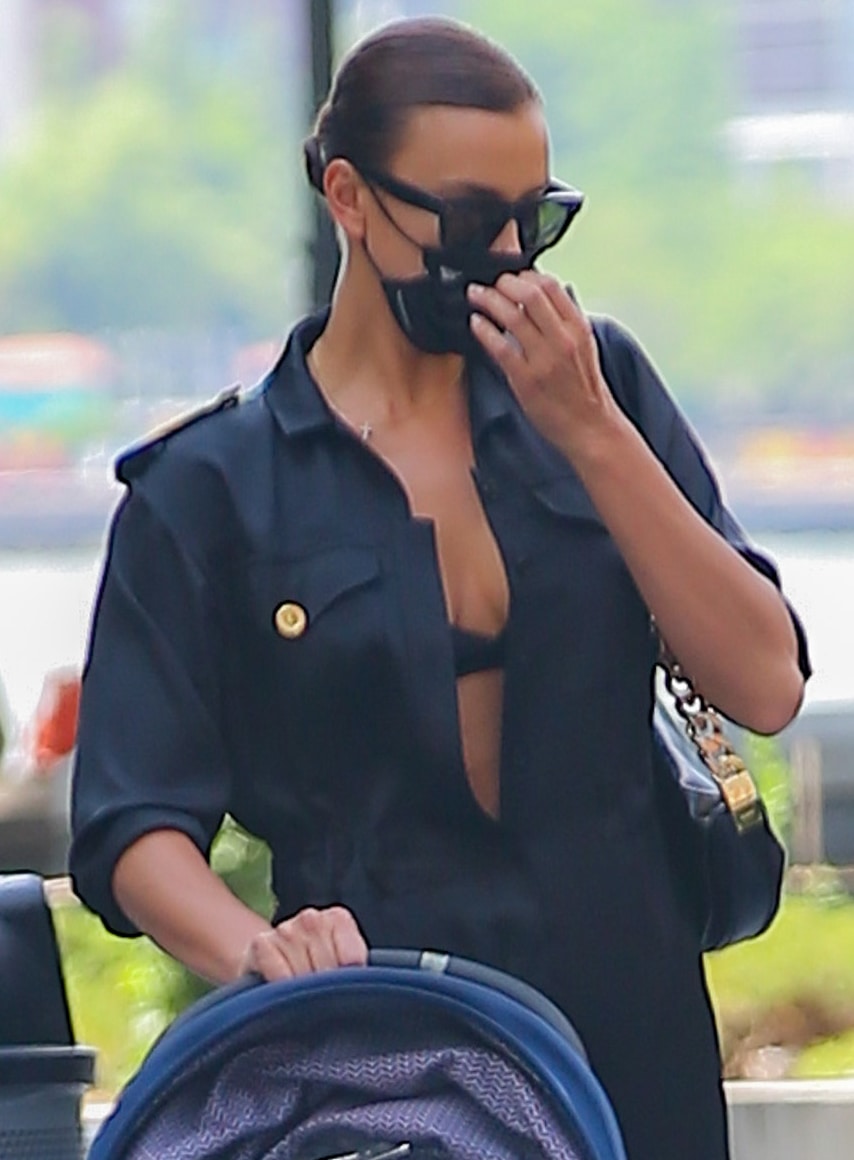 Irina Shayk keeps it low-key with Celine Tilda sunglasses and Naked Cashmere x EvolveTogether face mask