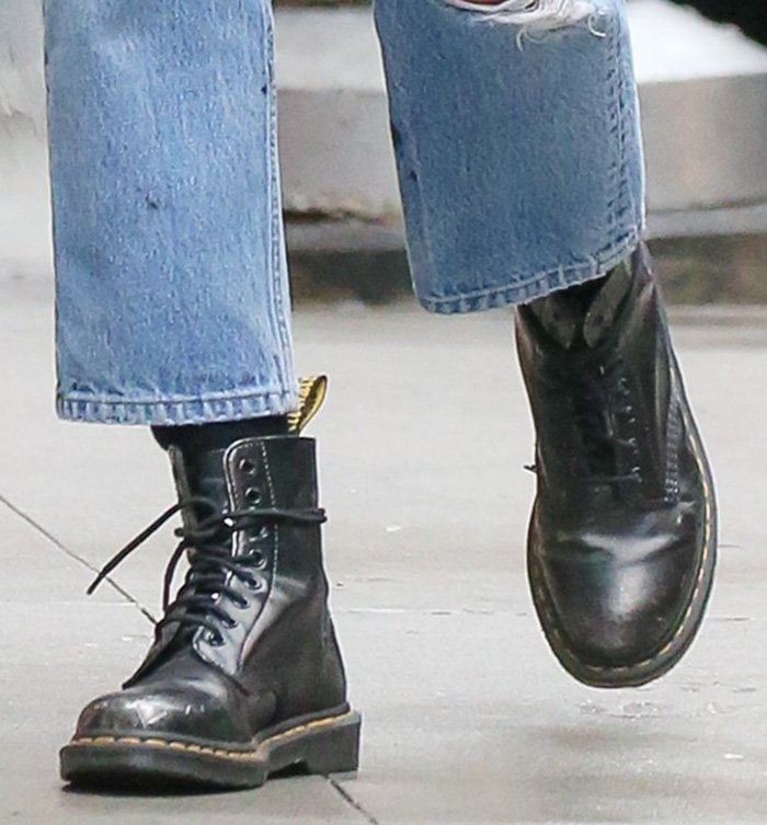 Irina Shayk completes her edgy vintage outfit with Dr. Martens 1460 boots