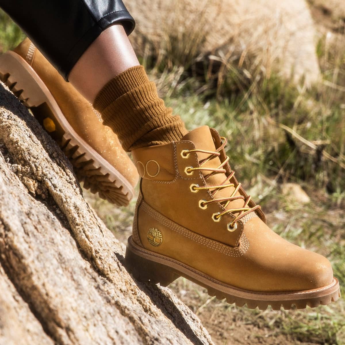 This leather-lined sustainably-made boot is grounded with durable Vibram outsoles and sprayed with gold glitter