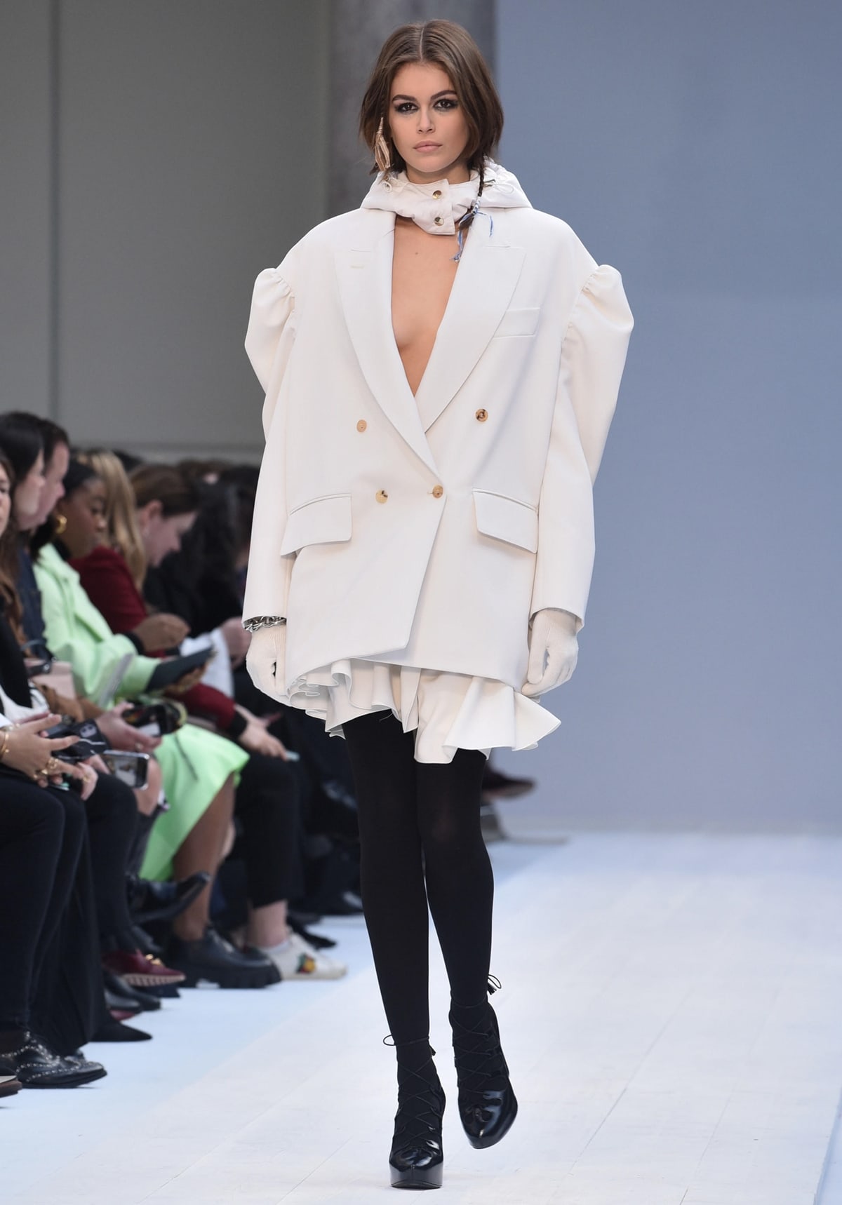 Kaia Gerber walks the runway during the Max Mara fashion show