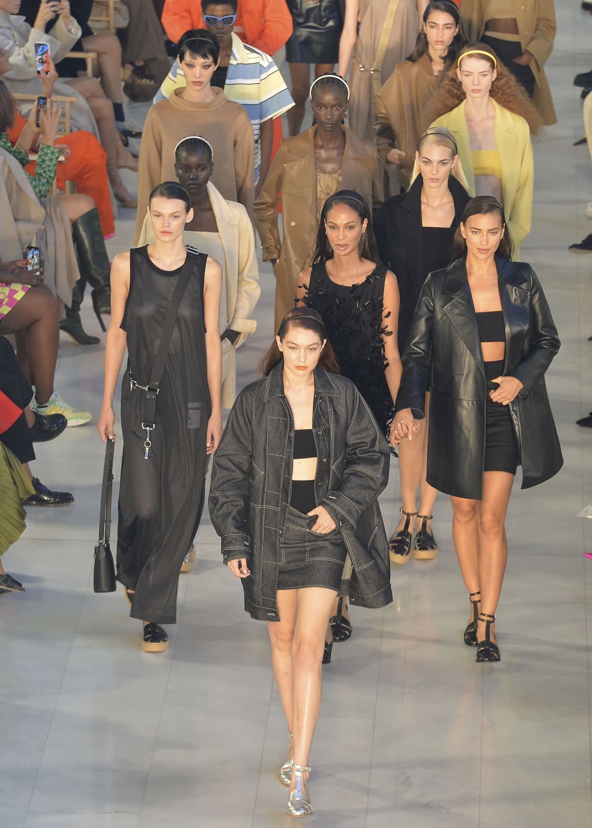 Cara Taylor, Gigi Hadid, Joan Smalls, and Irina Shayk walk the runway at the Max Mara fashion show