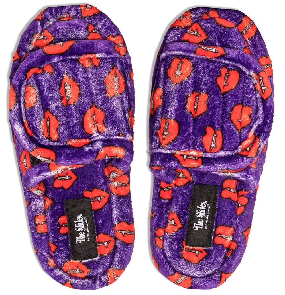 Make a statement in these furry fang-print purple slides with touch-strap fastenings