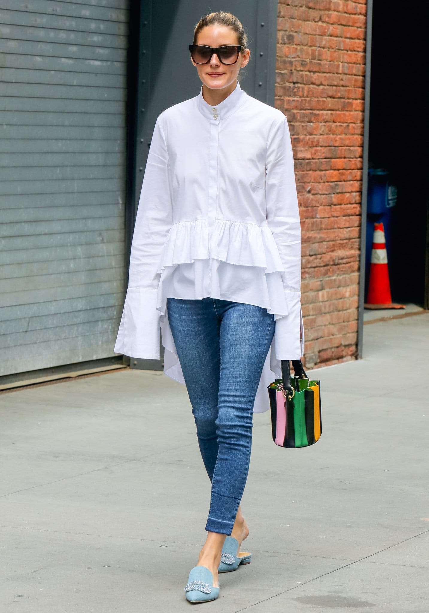 Olivia Palermo steps out in New York City in a Caroline Constas ruffled shirt and skinny jeans