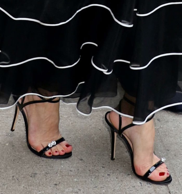 Olivia Palermo completes her evening look with Giuseppe Zanotti Ellie sandals that are dotted with two crystals studs