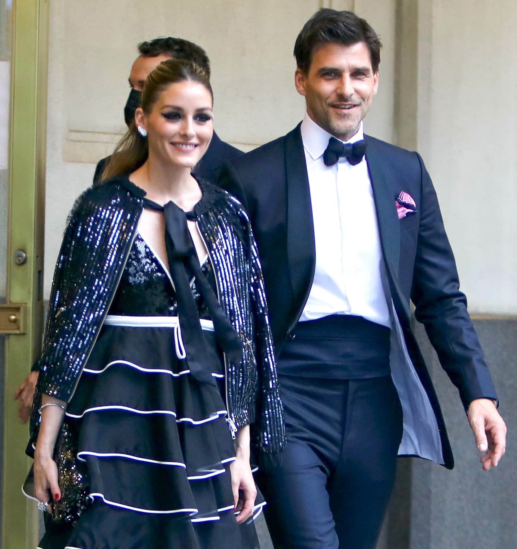 Olivia Palermo accessorizes with Piaget diamond earrings, a bracelet, a statement ring, and a Zara clutch