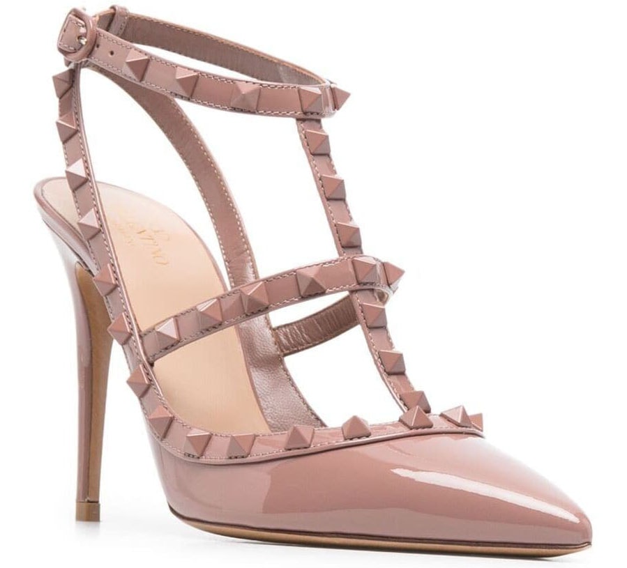 Iconic Fashion Statement: Valentino's Rockstud Slingback ankle-strap pumps feature a closed pointed-toe design, making them a popular choice for those seeking a blend of classic elegance and modern edginess