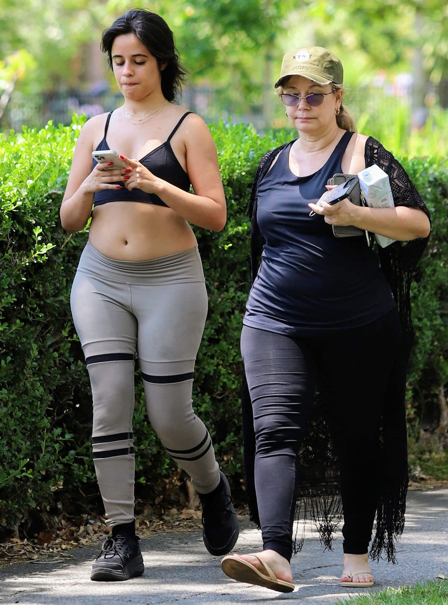 Camila Cabello exercising with her mom, Sinuhe Estrabao, at a Los Angeles park on July 16, 2021