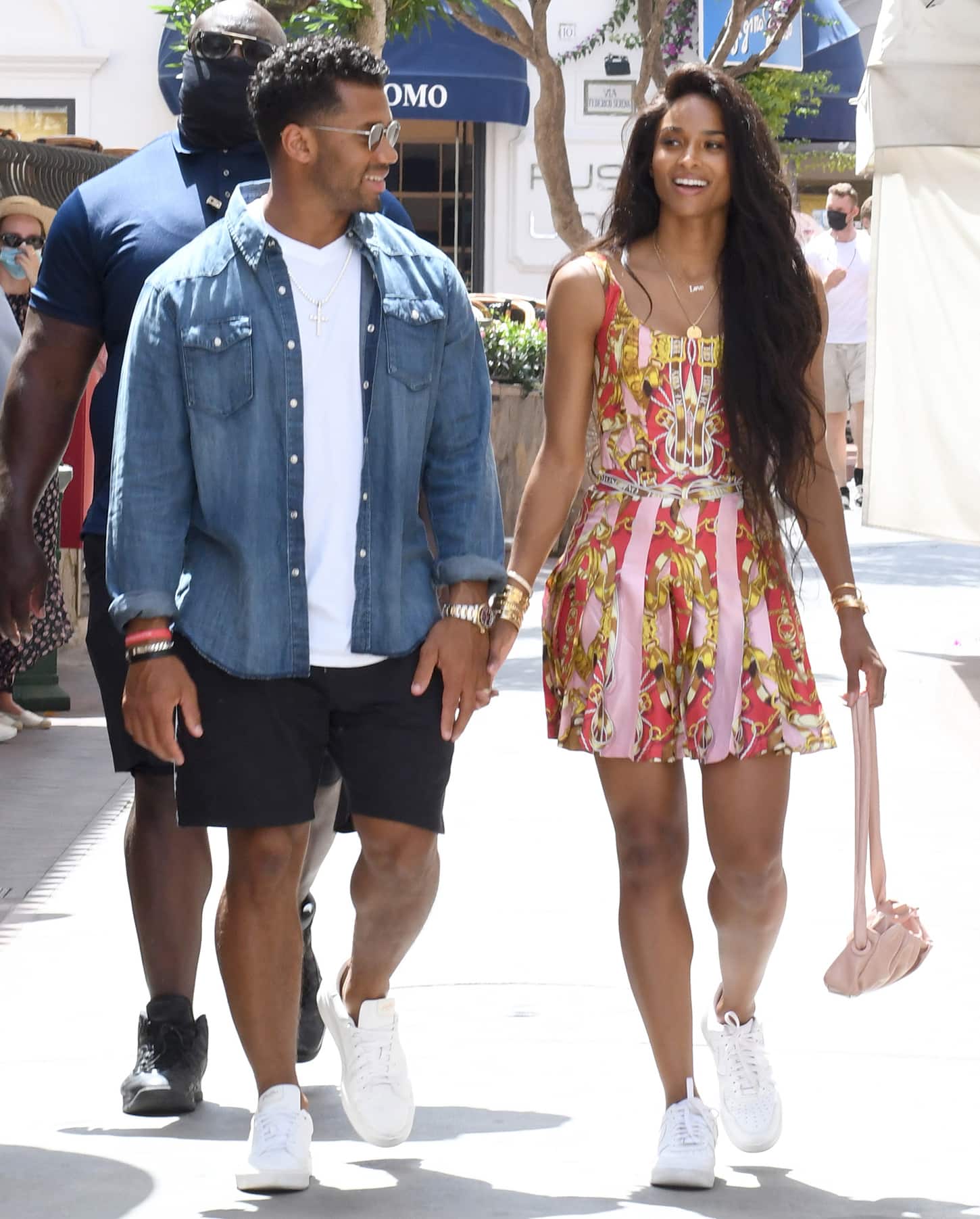 Ciara shows off her toned legs in a chic patterned Moschino mini dress