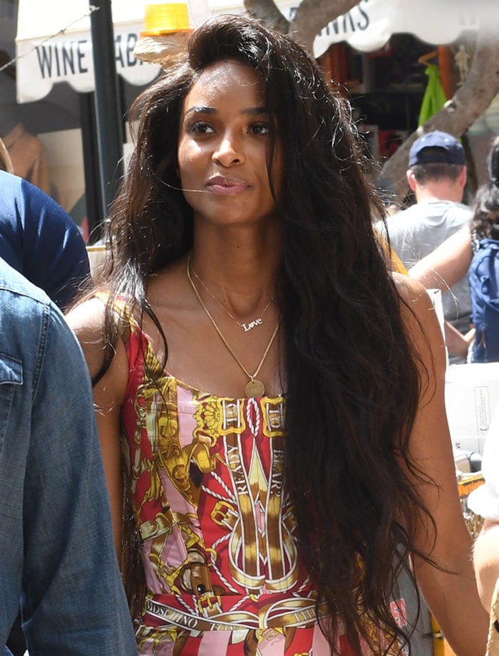 Ciara wears her long natural tresses down and enhances her beauty with minimal makeup