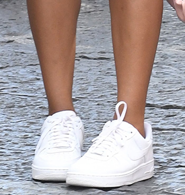 Ciara pairs her mini dress with white Nike Air Force 1 shoes