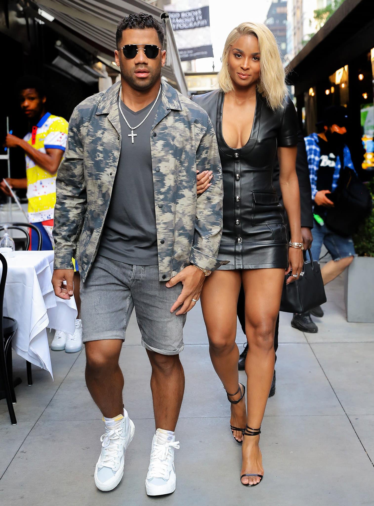 Ciara shows off her cleavage and legs in David Koma black leather mini dress