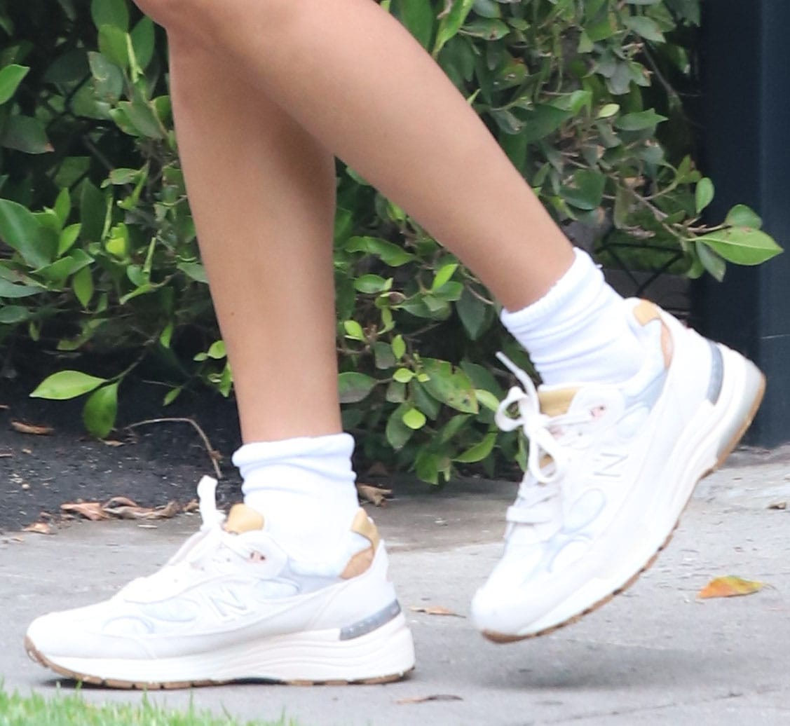 Hailey Bieber matches her outerwear with her New Balance Made US 922 shoes