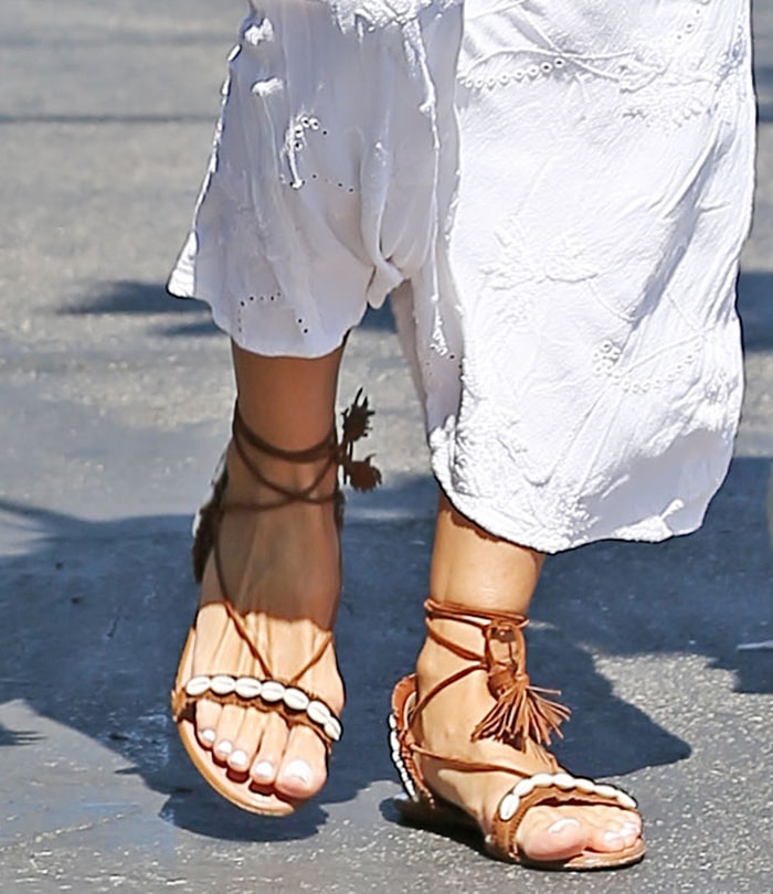 Heidi Klum completes her summery bohemian look with Aquazzura Riviera shell-embellished flat sandals