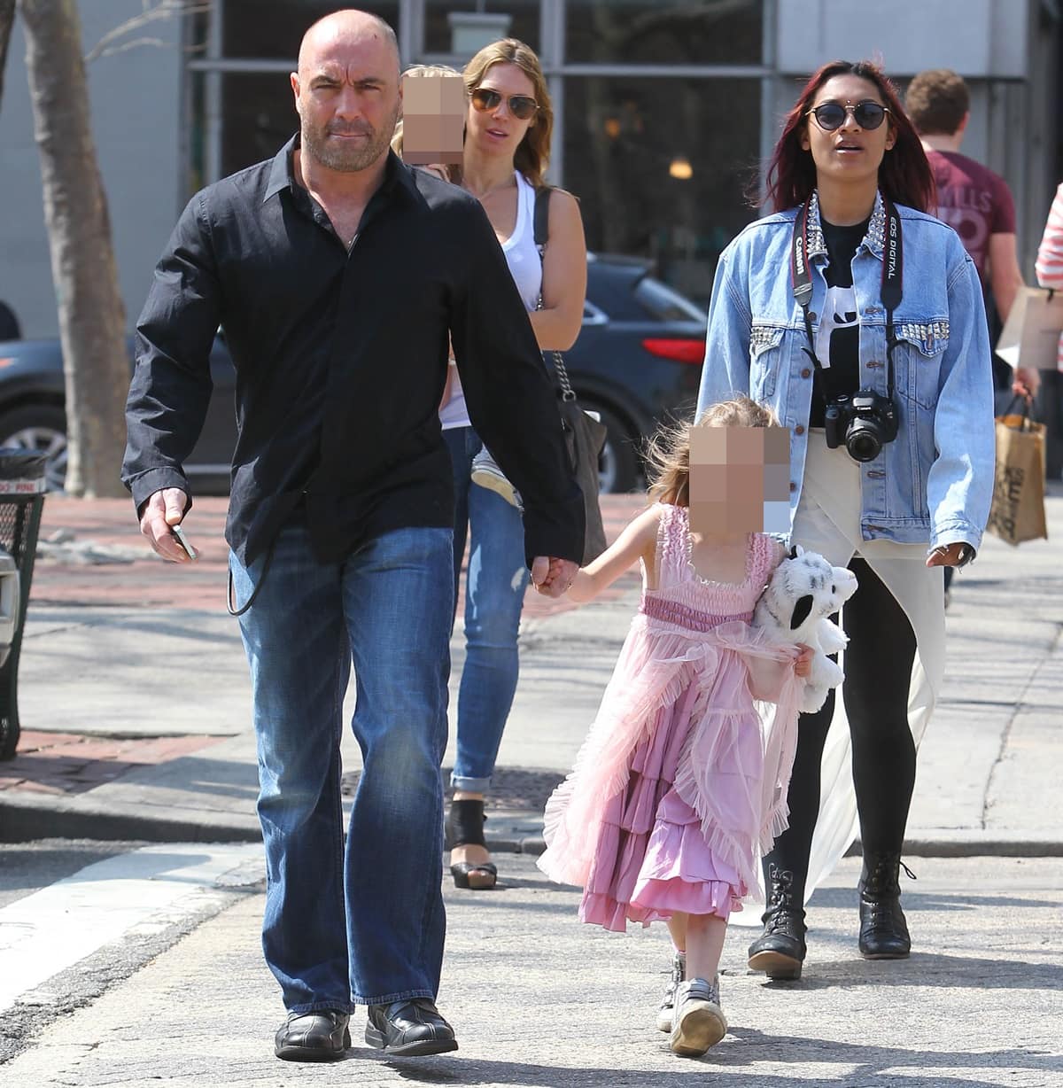 Joe Rogan is seen taking a walk with his wife, Jessica Rogan, and daughters in Soho