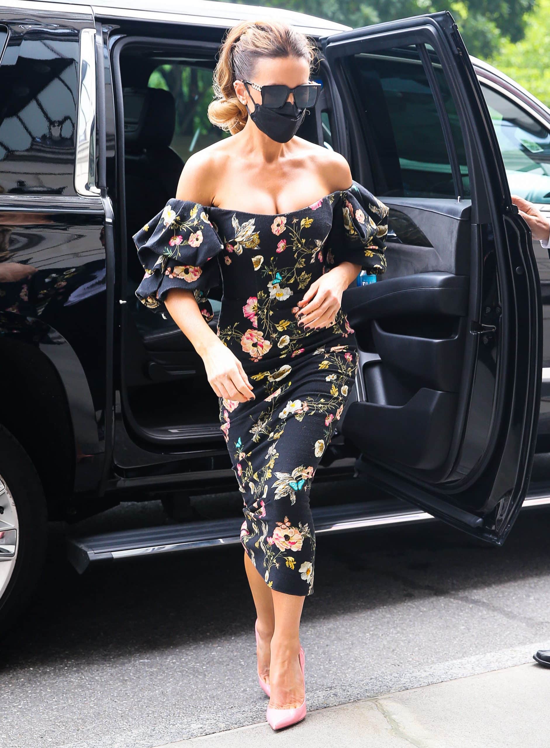Kate Beckinsale opts for a girly floral-print off-the-shoulder midi dress from Monique Lhuillier