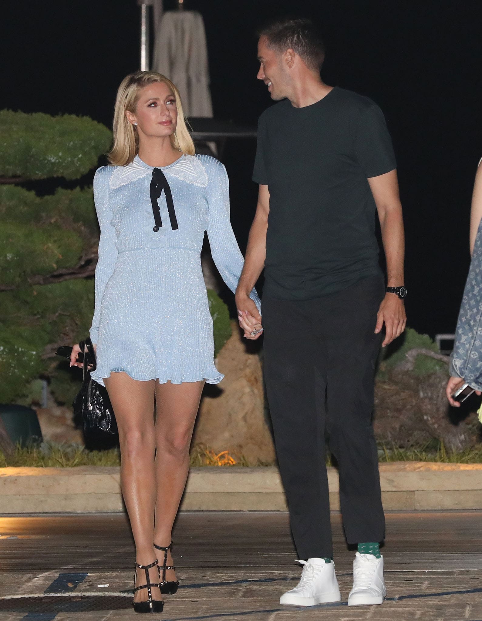 Paris Hilton and fiancé Carter Reum walk hand-in-hand while leaving Nobu Malibu on July 4, 2021